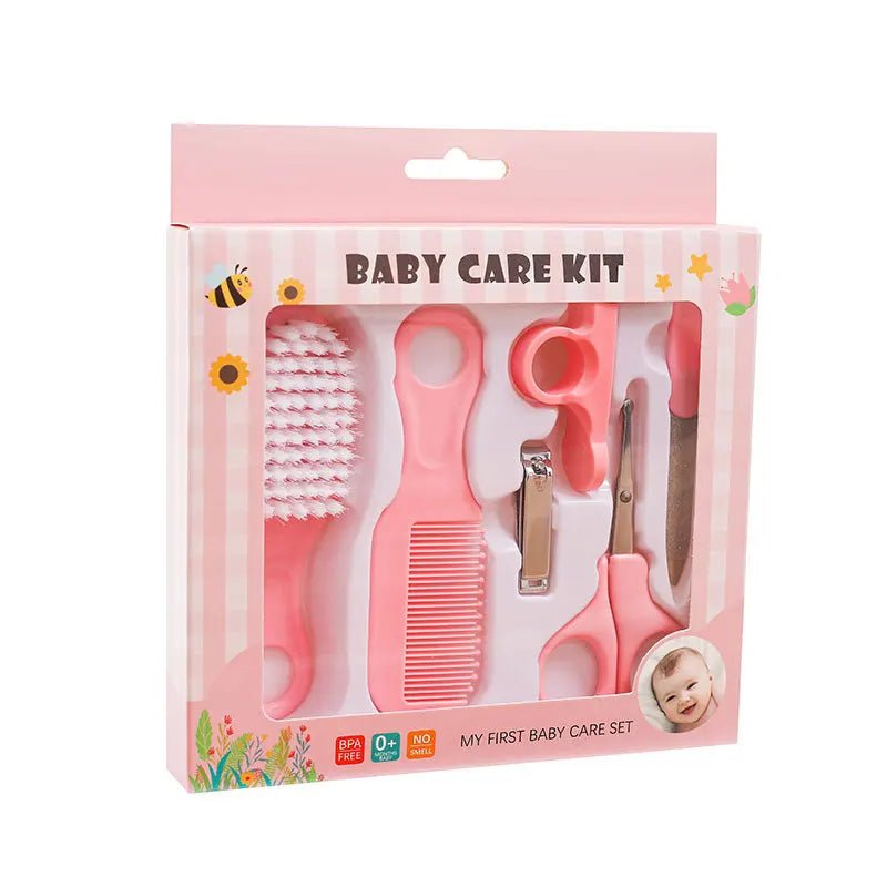 Baby care kit packaging with pink tools on a white background
