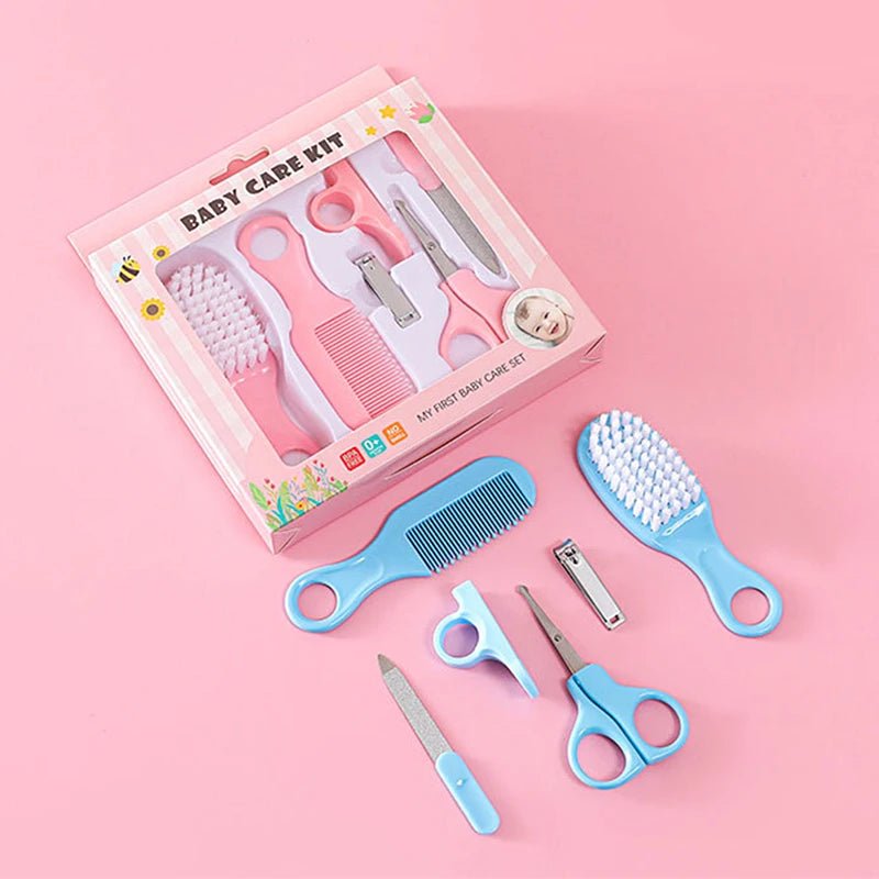 Baby care kit with tools and packaging on a pink background