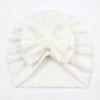White headband with a bow on a white background