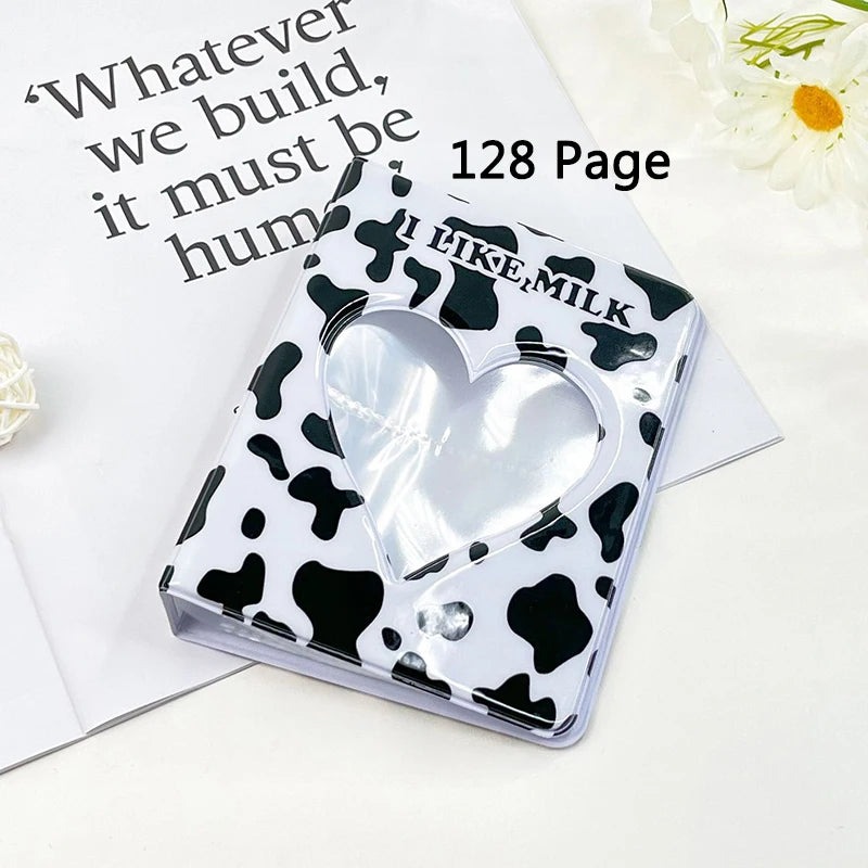 Clear notebook with cow print cover on a white background