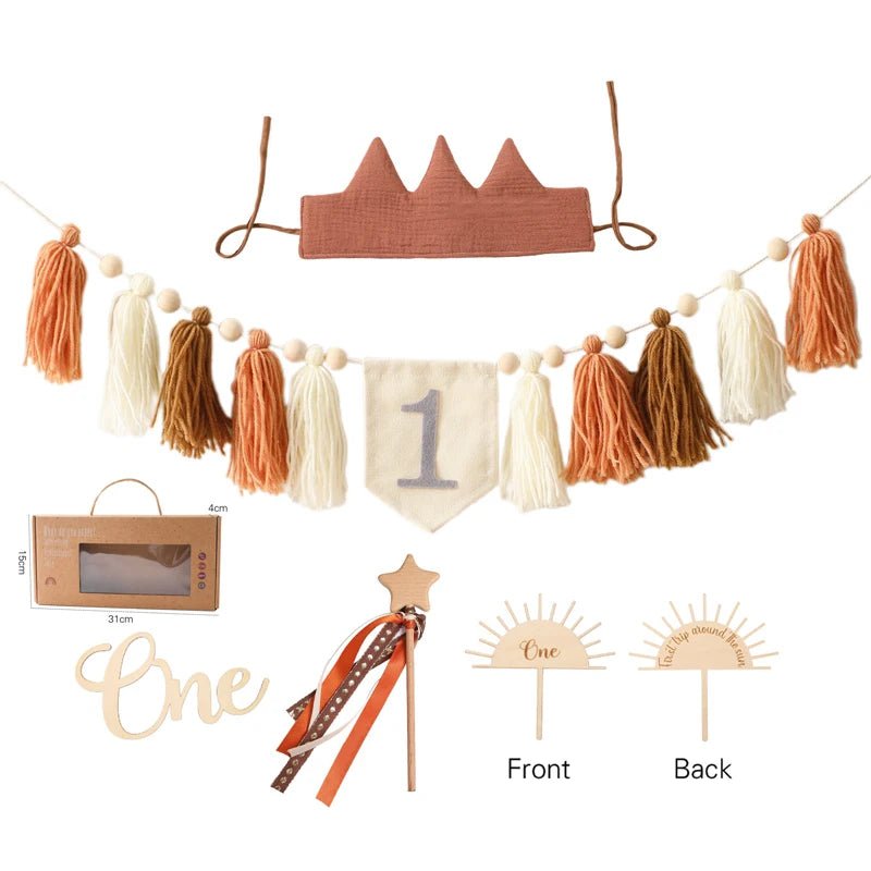 Collection of decorative items including a crown, tassel garland, and &