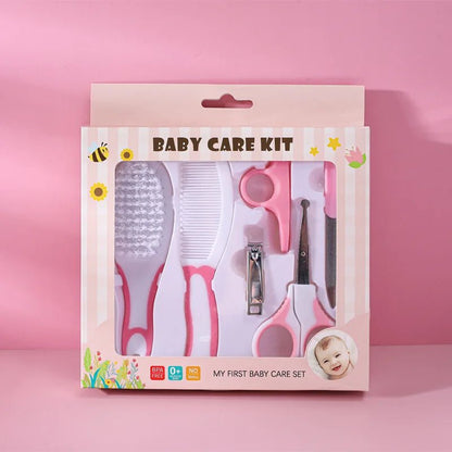 Baby care kit packaging with tools on a pink background