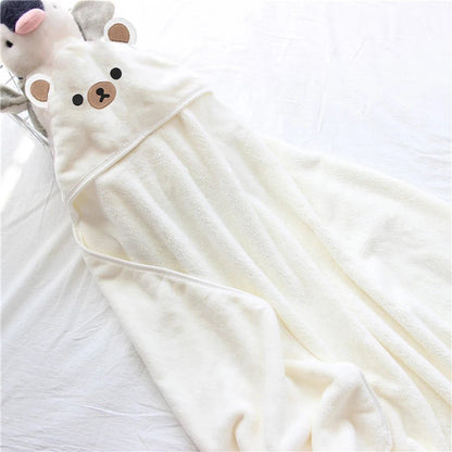 White baby blanket with bear ears and face on a white background