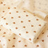 Folded fabric with heart patterns on a matching background