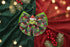 A Christmas-themed hair bow featuring a Grinch face, green Grinch characters, red and black plaid patterns, and green trim, displayed on a light gray textured surface.