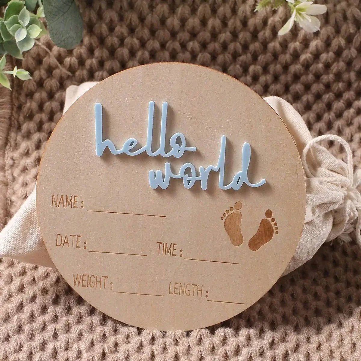 Round wooden sign with &