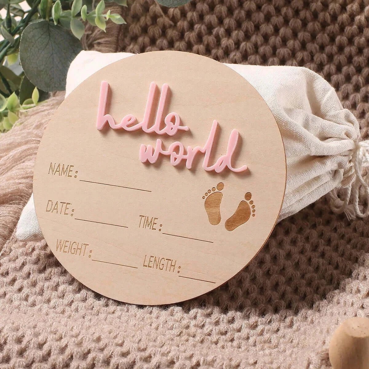 Round wooden plaque with &