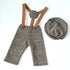 Plaid pants with suspenders and matching hat on a white background