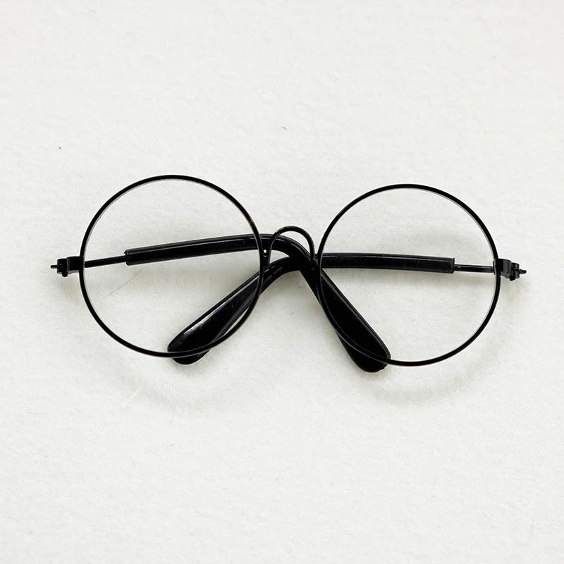 Black round eyeglasses on a white background