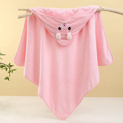 Pink hooded towel with cartoon character on a branch against a yellow background