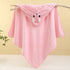 Pink hooded towel with cartoon character on a branch against a yellow background