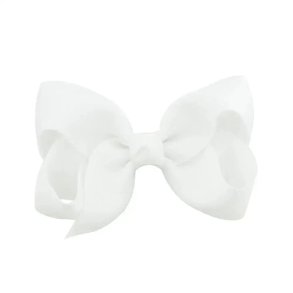 White bow-shaped hair accessory on a white background
